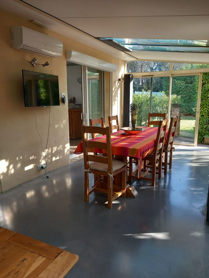 Bright conservatory opening onto the garden